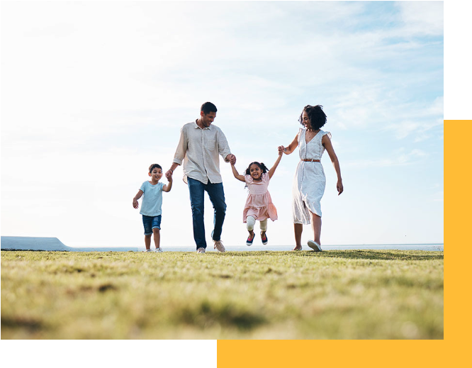 Photo of a family walking and holding hands outside